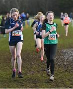 12 March 2022; Anna O'Callaghan of Ursuline Convent, Thurles, Tipperary, and Faustina Collins of Thornhill College, Derry, competing in the intermediate girls 3500m during the Irish Life Health All-Ireland Schools Cross Country at the City of Belfast Mallusk Playing Fields in Belfast. Photo by Ramsey Cardy/Sportsfile