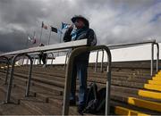 13 March 2022; A Dublin supporter enjoys a cup of tea on the terrace before the Allianz Football League Division 1 match between Tyrone and Dublin at O'Neill's Healy Park in Omagh, Tyrone. Photo by Ray McManus/Sportsfile