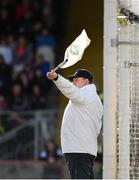 13 March 2022; An umpire waves a white flag, to indicate a point has been scored, during the Allianz Football League Division 1 match between Tyrone and Dublin at O'Neill's Healy Park in Omagh, Tyrone. Photo by Ray McManus/Sportsfile