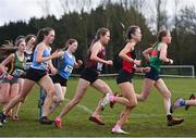 12 March 2022; Emma McEvoy of Loreto Stephens Green, Dublin, centre, competing in the senior girls 3500m during the Irish Life Health All-Ireland Schools Cross Country at the City of Belfast Mallusk Playing Fields in Belfast. Photo by Ramsey Cardy/Sportsfile