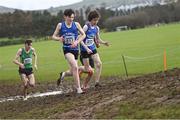 12 March 2022; Niall Murphy, 857, and Dean Casey of St Flannans Ennis, Clare, competing in the senior boys 6500m during the Irish Life Health All-Ireland Schools Cross Country at the City of Belfast Mallusk Playing Fields in Belfast. Photo by Ramsey Cardy/Sportsfile