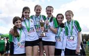 12 March 2022; On the podium after the junior girls race are Sullivan Upper School, Holywood, Belfast, during the Irish Life Health All-Ireland Schools Cross Country at the City of Belfast Mallusk Playing Fields in Belfast. Photo by Ramsey Cardy/Sportsfile