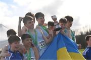 12 March 2022; On the podium after the junior boys race are St Michael's College, Enniskillen, Fermanagh, during the Irish Life Health All-Ireland Schools Cross Country at the City of Belfast Mallusk Playing Fields in Belfast. Photo by Ramsey Cardy/Sportsfile