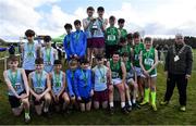 12 March 2022; On the podium after the junior boys race are, from left, St Flannans Ennis, Clare, St Michael's College, Enniskillen, Fermanagh, and Coláiste Mhuire, Mullingar, Westmeath, during the Irish Life Health All-Ireland Schools Cross Country at the City of Belfast Mallusk Playing Fields in Belfast. Photo by Ramsey Cardy/Sportsfile