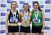 27 February 2022;  Senior women's 800m medallists, Louise Shanahan of Leevale AC, Cork, gold, Claire Mooney of Naas AC, Kildare, silver, and Niamh Carr of Ballymena and Antrim AC, bronze, during day two of the Irish Life Health National Senior Indoor Athletics Championships at the National Indoor Arena at the Sport Ireland Campus in Dublin. Photo by Sam Barnes/Sportsfile