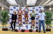 27 February 2022;  Olympian Derval O'Rourke, left, and Athletics Ireland Chair of Competition Andrew Lynam with senior women's 60m medallists, Molly Scott of St Laurence O'Toole AC, Carlow, gold, Lauren Roy of City of Lisburn AC, Down, silver and Sarah Leahy of Killarney Valley AC, Kerry, bronze, during day two of the Irish Life Health National Senior Indoor Athletics Championships at the National Indoor Arena at the Sport Ireland Campus in Dublin. Photo by Sam Barnes/Sportsfile