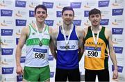 27 February 2022; Men's 800m medallists, Mark English of Finn Valley AC, Donegal, gold, Cillian Kirwan of Raheny Shamrock AC, Dublin, silver, and Roland Surlis of Annalee AC, Cavan, bronze,during day two of the Irish Life Health National Senior Indoor Athletics Championships at the National Indoor Arena at the Sport Ireland Campus in Dublin. Photo by Sam Barnes/Sportsfile