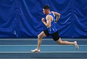 27 February 2022; Eanna Madden of Carrick-on-Shannon AC, Leitrim, competing in the senior men's 400m during day two of the Irish Life Health National Senior Indoor Athletics Championships at the National Indoor Arena at the Sport Ireland Campus in Dublin. Photo by Sam Barnes/Sportsfile