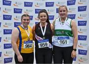 27 February 2022; Women's shot put medallists, Michaela Walsh of Swinford AC, Mayo, gold, Aoibhín McMahon of Blackrock AC, Louth, silver, and Ciara Sheehy of Emerald AC, Limerick, bronze, during day two of the Irish Life Health National Senior Indoor Athletics Championships at the National Indoor Arena at the Sport Ireland Campus in Dublin. Photo by Sam Barnes/Sportsfile