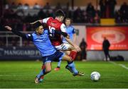 14 March 2022; Sean Brennan of UCD in action against Adam O'Reilly of St Patrick's Athletic during the SSE Airtricity League Premier Division match between St Patrick's Athletic and UCD at Richmond Park in Dublin. Photo by Piaras Ó Mídheach/Sportsfile