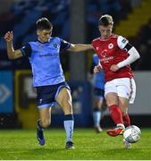 14 March 2022; Chris Forrester of St Patrick's Athletic in action against Dylan Duffy of UCD during the SSE Airtricity League Premier Division match between St Patrick's Athletic and UCD at Richmond Park in Dublin. Photo by Piaras Ó Mídheach/Sportsfile