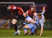 14 March 2022; Dawson Devoy of Bohemians in action against Shane Farrell and Brian McManus of Shelbourne during the SSE Airtricity League Premier Division match between Bohemians and Shelbourne at Dalymount Park in Dublin. Photo by Brendan Moran/Sportsfile