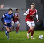 14 March 2022; Chris Forrester of St Patrick's Athletic in action against Evan Caffrey of UCD during the SSE Airtricity League Premier Division match between St Patrick's Athletic and UCD at Richmond Park in Dublin. Photo by Piaras Ó Mídheach/Sportsfile