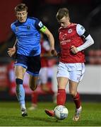 14 March 2022; Chris Forrester of St Patrick's Athletic in action against Sam Todd of UCD during the SSE Airtricity League Premier Division match between St Patrick's Athletic and UCD at Richmond Park in Dublin. Photo by Piaras Ó Mídheach/Sportsfile