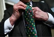 15 March 2022; Racegoer Dessie O'Reilly fixes his tie on day one of the Cheltenham Racing Festival at Prestbury Park in Cheltenham, England. Photo by David Fitzgerald/Sportsfile