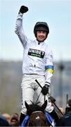 15 March 2022; Jockey Nico de Boinville celebrates after winning the Sky Bet Supreme Novices' Hurdle on Constitution Hill during day one of the Cheltenham Racing Festival at Prestbury Park in Cheltenham, England. Photo by Seb Daly/Sportsfile