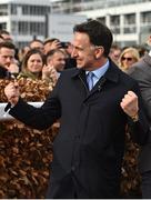 15 March 2022; Trainer Henry de Bromhead celebrates after sending out Honeysuckle to win the Unibet Champion Hurdle Challenge Trophy during day one of the Cheltenham Racing Festival at Prestbury Park in Cheltenham, England. Photo by Seb Daly/Sportsfile