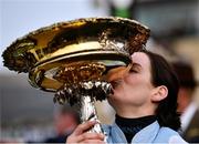 15 March 2022; Rachael Blackmore kisses the trophy after winning the Unibet Champion Hurdle Challenge Trophy on Honeysuckle during day one of the Cheltenham Racing Festival at Prestbury Park in Cheltenham, England. Photo by David Fitzgerald/Sportsfile