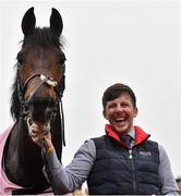 15 March 2022; Groom Ian Queally celebrates with Brazil after their victory in the Boodles Juvenile Handicap Hurdle during day one of the Cheltenham Racing Festival at Prestbury Park in Cheltenham, England. Photo by Seb Daly/Sportsfile