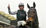 16 March 2022; Jockey Charlie Deutsch celebrates after riding L'Homme Presse to victory in the Brown Advisory Novices' Chase on day two of the Cheltenham Racing Festival at Prestbury Park in Cheltenham, England. Photo by Seb Daly/Sportsfile