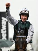 16 March 2022; Jockey Charlie Deutsch celebrates after riding L'Homme Presse to victory in the Brown Advisory Novices' Chase on day two of the Cheltenham Racing Festival at Prestbury Park in Cheltenham, England. Photo by David Fitzgerald/Sportsfile
