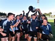 16 March 2022; Callum Beasley of Ardgillan Community College lifting the cup with teammates after the Pat Rossiter Cup Final match between St Mary’s CBS Portlaoise, Laois and Ardgillan Community College, Dublin at Energia Park in Dublin. Photo by Eóin Noonan/Sportsfile