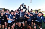 16 March 2022; Callum Beasley of Ardgillan Community College lifting the cup with teammates after the Pat Rossiter Cup Final match between St Mary’s CBS Portlaoise, Laois and Ardgillan Community College, Dublin at Energia Park in Dublin. Photo by Eóin Noonan/Sportsfile