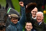 16 March 2022; Groom Imran Haider, left, owner Tony Bloom and trainer Willie Mullins, right, celebrate after winning the Betway Queen Mother Champion Chase with Energumene on day two of the Cheltenham Racing Festival at Prestbury Park in Cheltenham, England. Photo by Seb Daly/Sportsfile