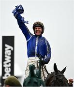 16 March 2022; Jockey Paul Townend celebrates after riding Energumene to victory in the Betway Queen Mother Champion Chase on day two of the Cheltenham Racing Festival at Prestbury Park in Cheltenham, England. Photo by David Fitzgerald/Sportsfile