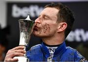 16 March 2022; Jockey Paul Townend celebrates after winning the Betway Queen Mother Champion Chase with Energumene on day two of the Cheltenham Racing Festival at Prestbury Park in Cheltenham, England. Photo by David Fitzgerald/Sportsfile