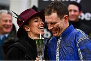 16 March 2022; Jockey Paul Townend celebrates with girlfriend Anna Paoletti after winning the Betway Queen Mother Champion Chase with Energumene on day two of the Cheltenham Racing Festival at Prestbury Park in Cheltenham, England. Photo by David Fitzgerald/Sportsfile