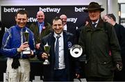 16 March 2022; Jockey Paul Townend, owner Tony Bloom and trainer Willie Mullins, right, after winning the Betway Queen Mother Champion Chase with Energumene on day two of the Cheltenham Racing Festival at Prestbury Park in Cheltenham, England. Photo by David Fitzgerald/Sportsfile
