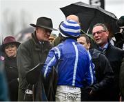 16 March 2022; Trainer Willie Mullins and owner Tony Bloom, right, speak to jockey Paul Townend after winning the Betway Queen Mother Champion Chase with Energumene on day two of the Cheltenham Racing Festival at Prestbury Park in Cheltenham, England. Photo by David Fitzgerald/Sportsfile