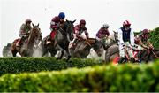 16 March 2022; Eventual winner Delta Work, with Jack Kennedy up, second from left, jumps alongside eventual second place Tiger Roll, with Davy Russell up, third from left, during the Glenfarclas Cross Country Chase on day two of the Cheltenham Racing Festival at Prestbury Park in Cheltenham, England. Photo by David Fitzgerald/Sportsfile
