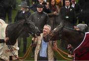16 March 2022; Owner Michael O'Leary with the winner of Glenfarclas Cross Country Chase, Delta Work, left, and second place Tiger Roll, right, on day two of the Cheltenham Racing Festival at Prestbury Park in Cheltenham, England. Photo by Seb Daly/Sportsfile
