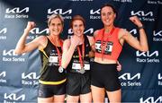 17 March 2022; Top three female finishers, from left, Ann-Marie McGlynn of Letterkenny AC, Donegal, second, Aoife Cooke of Eagle AC, Cork, first, and Aoife Kilgallon of Sligo AC, third, after the Kia Race Series 5k of Portlaoise in Laois. Photo by Ben McShane/Sportsfile