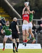 13 March 2022; Joe Grimes of Cork in action against Ronan Jones of Meath during the Allianz Football League Division 2 match between Meath and Cork at Páirc Táilteann in Navan, Meath. Photo by Brendan Moran/Sportsfile