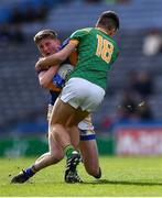 17 March 2022; Colm Dalton of Naas CBS is tackled by Tommy Phelan of St Kieran's College during the Masita GAA Football All Ireland Post Primary Schools Hogan Cup Final match between Naas CBS, Kildare, and St Brendan's College Killarney, Kerry, at Croke Park in Dublin. Photo by Piaras Ó Mídheach/Sportsfile