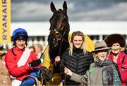 17 March 2022; Jockey Paul Townend, groom Ruth Dudfield and owner Patricia Thompson, Cheveley Park Stud, second from right, after winning the Ryanair Chase with Allaho on day three of the Cheltenham Racing Festival at Prestbury Park in Cheltenham, England. Photo by Seb Daly/Sportsfile