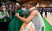 27 February 2022; Sean Flood of Ireland celebrates with his mother Margaret after the FIBA EuroBasket 2025 Pre-Qualifiers First Round Group A match between Ireland and Cyprus at the National Basketball Arena in Tallaght, Dublin. Photo by Brendan Moran/Sportsfile