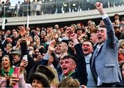 17 March 2022; Racegoers celebrate after Flooring Porter, with Danny Mullins up, won the Paddy Power Stayers' Hurdle on day three of the Cheltenham Racing Festival at Prestbury Park in Cheltenham, England. Photo by Seb Daly/Sportsfile