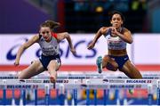 18 March 2022; Léonie Cambours of France, left, and Katarina Johnson-Thompson of Great Britain, competing in the 60m hurdles of women's Pentathlon during day one of the World Indoor Athletics Championships at the Štark Arena in Belgrade, Serbia. Photo by Sam Barnes/Sportsfile