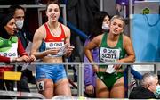 18 March 2022; Molly Scott of Ireland, right, after competing in the women's 60m during day one of the World Indoor Athletics Championships at the Štark Arena in Belgrade, Serbia. Photo by Sam Barnes/Sportsfile