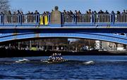 18 March 2022; The UCD team, from front to back, Robin Keane, cox, Fintan Earley, stroke, Niall Herlihy, Andrew Kelly, Thomas Bedford, David Somers, Andrew Carroll, Michael Campion and Sam Daly, bow, on their way to defeating Trinity in the Gannon Cup during the Annual Colours Boat Races between UCD and Trinity on the River Liffey in Dublin. Photo by Piaras Ó Mídheach/Sportsfile