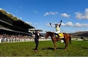 18 March 2022; Jockey Paul Townend celebrates after riding Vauban to victory in the JCB Triumph Hurdle with groom Adam Connolly during day four of the Cheltenham Racing Festival at Prestbury Park in Cheltenham, England. Photo by Seb Daly/Sportsfile