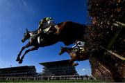 18 March 2022; Icare Allen, with Mark Walsh up, left, with Vauban, with Paul Townend up, jump the last, first time round, during the JCB Triumph Hurdle during day four of the Cheltenham Racing Festival at Prestbury Park in Cheltenham, England. Photo by David Fitzgerald/Sportsfile