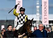 18 March 2022; Jockey Sean O'Keeffe on The Nice Guy celebrates in the parade ring after winning the Albert Bartlett Novices' Hurdle during day four of the Cheltenham Racing Festival at Prestbury Park in Cheltenham, England. Photo by David Fitzgerald/Sportsfile