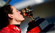 18 March 2022; Rachael Blackmore kisses the Gold Cup after winning the Boodles Cheltenham Gold Cup Chase aboard A Plus Tard during day four of the Cheltenham Racing Festival at Prestbury Park in Cheltenham, England. Photo by Seb Daly/Sportsfile