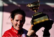 18 March 2022; Rachael Blackmore celebrates with the Gold Cup after winning the Boodles Cheltenham Gold Cup Chase aboard A Plus Tard during day four of the Cheltenham Racing Festival at Prestbury Park in Cheltenham, England. Photo by David Fitzgerald/Sportsfile