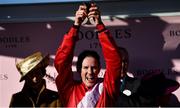 18 March 2022; Rachael Blackmore celebrates with the Gold Cup after winning the Boodles Cheltenham Gold Cup Chase aboard A Plus Tard during day four of the Cheltenham Racing Festival at Prestbury Park in Cheltenham, England. Photo by David Fitzgerald/Sportsfile